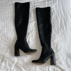 INC International Concepts black leather boots.